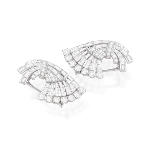 35 - BOUCHERON: A FINE DIAMOND DOUBLE-CLIP BROOCH, CIRCA 1945-50  Of openwork fan shape, set with brillia... 