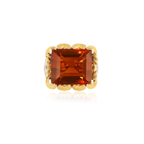 37 - BOUCHERON: A CITRINE AND DIAMOND COCKTAIL RING, CIRCA 1960  The rectangular-cut smokey citrine weigh... 