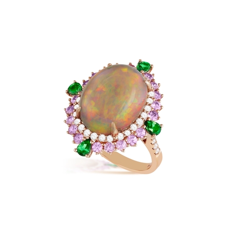 76 - AN OPAL AND GEM-SET COCKTAIL RING  The central oval-shaped opal cabochon within closed-back setting,... 