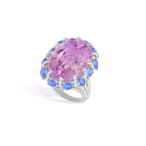 80 - A KUNZITE, SAPPHIRE AND DIAMOND COCKTAIL RING  The oval-shaped kunzite weighing approximately 34.00c... 