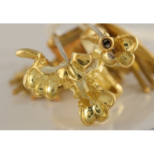 47 - A GOLD AND DIAMOND NOVELTY BROOCH, FRENCH, CIRCA 1960  Designed as a stylised dog, the textured gold... 