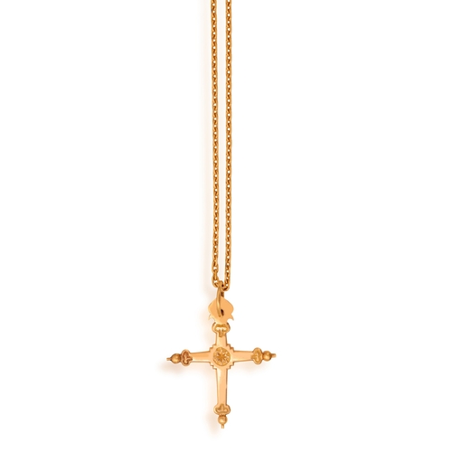 101 - A GOLD PENDANT ON CHAIN  The cross pendant with engraving and beading detailing, with suspension loo... 