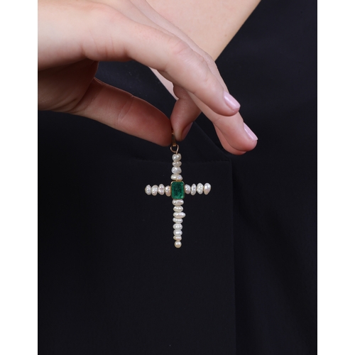 90 - A FRESHWATER CULTURED PEARL AND EMERALD CROSS PENDANT  The cross set with freshwater cultured pearls... 