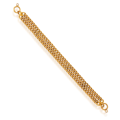 86 - AN 18K GOLD BRACELET  The double curb-link chain, with suspension loop on both terminals, clasp defi... 