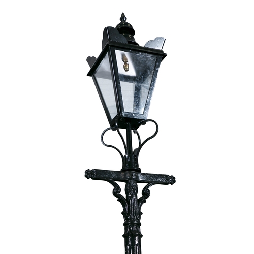 304 - A PAIR OF LARGE VICTORIAN BLACK PAINTED STREET LAMPS,  each with heavy fluted centre column, surmoun... 