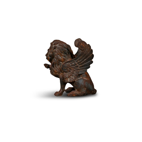 307 - A VICTORIAN CAST IRON MODEL OF A WINGED LION,   32cm high