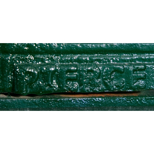 315 - AN IRISH VICTORIAN GREEN PAINTED CAST IRON GARDEN BENCH BY PIERCE OF WEXFORD,   the open gallery bac... 