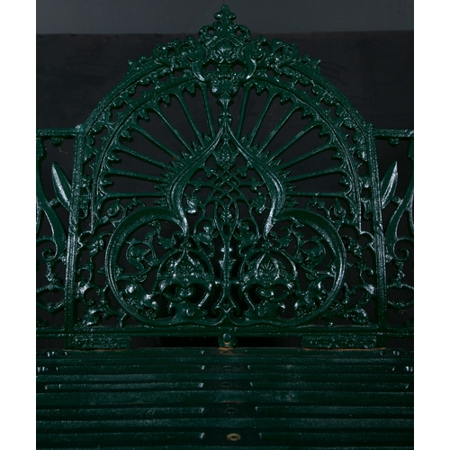 315 - AN IRISH VICTORIAN GREEN PAINTED CAST IRON GARDEN BENCH BY PIERCE OF WEXFORD,   the open gallery bac... 