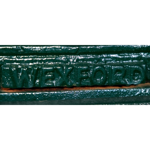 315 - AN IRISH VICTORIAN GREEN PAINTED CAST IRON GARDEN BENCH BY PIERCE OF WEXFORD,   the open gallery bac... 