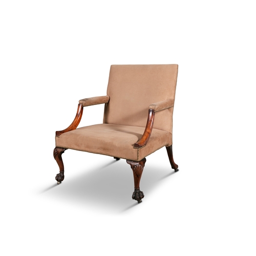 318 - A GEORGE III CARVED MAHOGANY GAINSBOROUGH ARMCHAIR,   with upholstered back and seat covered in a ta... 