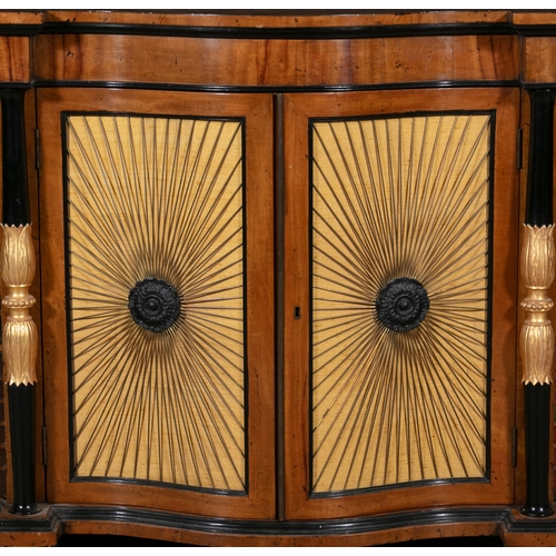 331 - A PAIR OF EDWARDIAN SATINWOOD SIDE CABINETS OF REGENCY STYLE  the bowfront twin doors with cloth bac... 