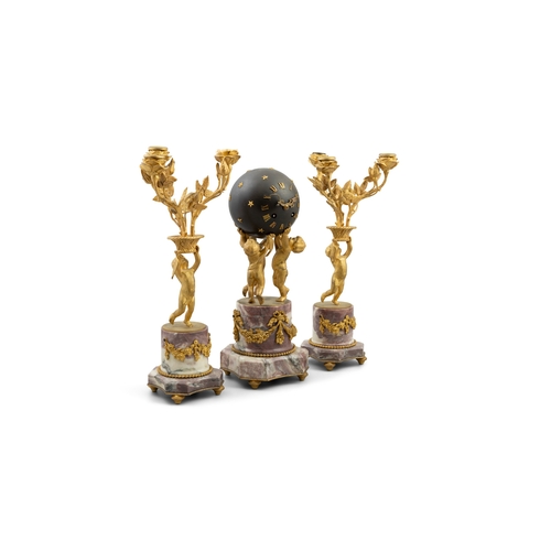 335 - A LOUISE XVI STYLE ORMOLU FIGUREAL THREE-PIECE CLOCK GARNITURE SIGNED OUDIN MARSEILLE,  the clock in... 