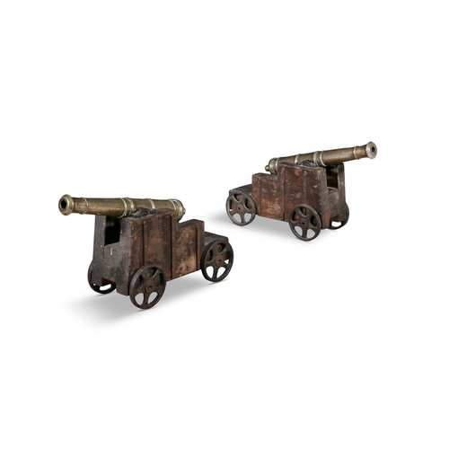 345 - A PAIR OF BRASS SIGNAL CANNONS ON TIMBER CARRIAGES,   c.65cm long; barrel 49cm long