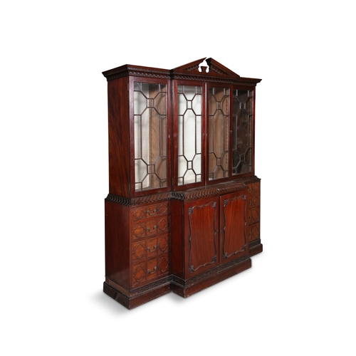 354 - A GEORGE III MAHOGANY BREAKFRONT BOOKCASE,   the moulded cornice surmounted by a pierced scrollwork ... 