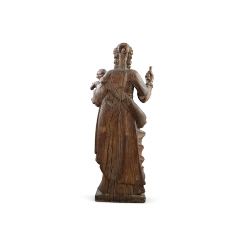 366A - A LATE 18TH / EARLY 19TH CENTURY CARVED OAK MODEL OF THE MADONNA AND CHILD,   modelled standing, in ... 