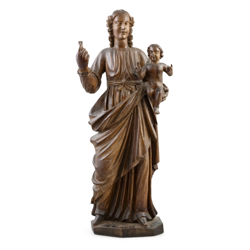 366A - A LATE 18TH / EARLY 19TH CENTURY CARVED OAK MODEL OF THE MADONNA AND CHILD,   modelled standing, in ... 