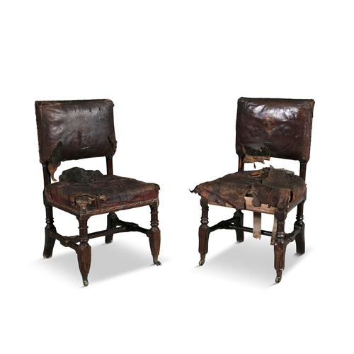 367 - ORDER OF SAINT PATRICK A PAIR OF GOTHIC REVIVAL OAK AND RED LEATHER SIDE CHAIRS IN THE MANNER OF PUG... 