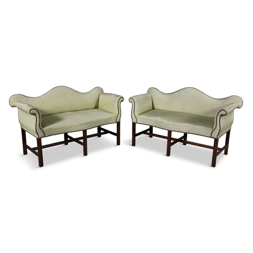 369 - A PAIR OF GEORGE III MAHOGANY FRAMED HUMP BACK SOFAS,  with outscrolling arms, and upholstered in mi... 