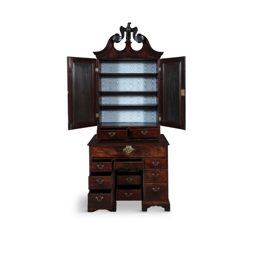 384 - A GEORGE II MAHOGANY SECRETAIRE BOOKCASE CIRCA 1750,   surmounted with an eagle and swan neck pedime... 