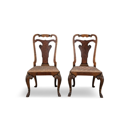 393 - A PAIR OF GEORGE I STYLE WALNUT SIDE CHAIRS,   the open backs with vase shaped splats, upholstered d... 