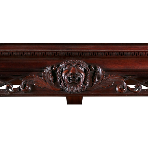 395 - AN IRISH CARVED MAHOGANY FOUR-POSTER BED 18/19TH CENTURY,   the rectangular moulded cornice carved t... 