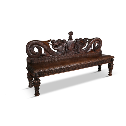 421 - A RARE IRISH CARVED WALNUT ARMORIAL BENCH 19TH CENTURY,   the pierced back carved in to the form of ... 