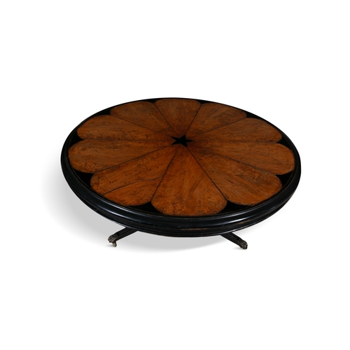 426 - AN ANGLO INDIAN EBONY AND WALNUT LARGE CIRCULAR CENTRE TABLE,   the moulded top, centred by a star m... 