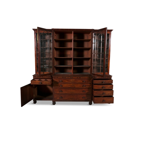 450 - A GEORGE IV MAHOGANY FOUR DOOR BREAKFRONT BOOKCASE BY JAMES WINTER,  the upper section with moulded ... 