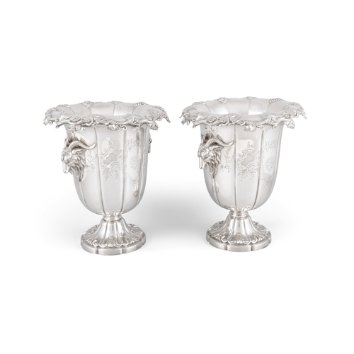 453 - A FINE PAIR OF SILVER PLATED WINE COOLERS WITH RAM'S HEAD TWIN HANDLES,   of campagna form, each wit... 