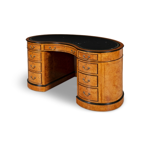 478 - A VICTORIAN STYLE BURR MAPLE KIDNEY SHAPED DESK,   with twin pedestals of four drawers with brass ha... 