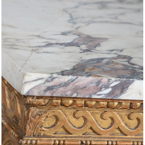 479 - A PAIR OF GILTWOOD AND MARBLE TOP CONSOLE TABLES IN THE STYLE OF WILLIAM KENT,  the white variegated... 