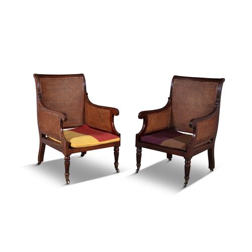 486 - A PAIR OF GEORGE IV MAHOGANY AND CANEWORK BERGÈRES WITH REEDED FRAMES,   cane back and seat on flute... 