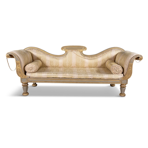 491A - A WILLIAM IV PAINTED AND PARCEL GILT DOUBLE SCROLL END SETTEE,   in the Empire taste, the frame with... 