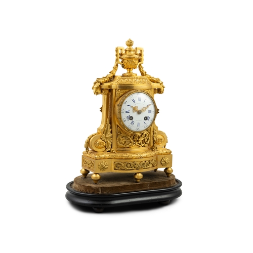 493 - A 19TH CENTURY ORMOLU MANTLE CLOCK BY CHARLES TAYLOR & SON, PARIS & BRISTOL   surmounted by a urn fi... 