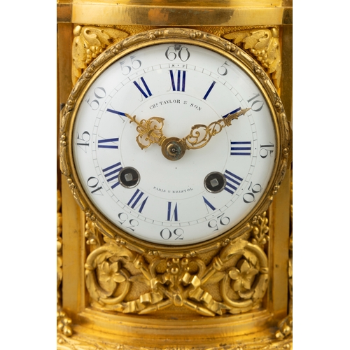 493 - A 19TH CENTURY ORMOLU MANTLE CLOCK BY CHARLES TAYLOR & SON, PARIS & BRISTOL   surmounted by a urn fi... 