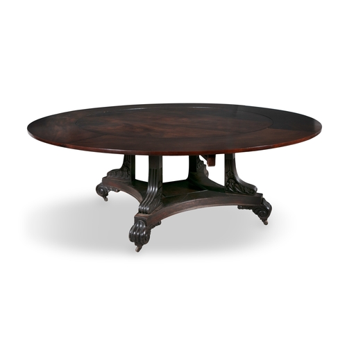 498 - A  MAHOGANY JUPE TABLE OF CIRCULAR FORM 19TH CENTURY,  Fitted with rounded extension leaves on flora... 