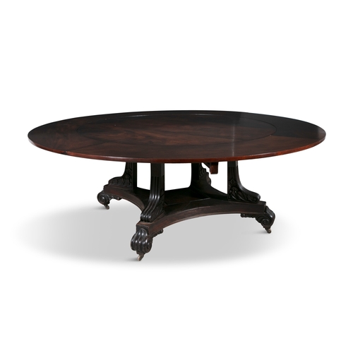 498 - A  MAHOGANY JUPE TABLE OF CIRCULAR FORM 19TH CENTURY,  Fitted with rounded extension leaves on flora... 