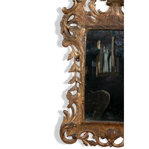 503A - AN IRISH GEORGE III GILTWOOD AND GESSO MIRROR,   of upright rectangular form, the plate contained wi... 