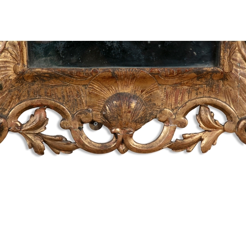 503A - AN IRISH GEORGE III GILTWOOD AND GESSO MIRROR,   of upright rectangular form, the plate contained wi... 