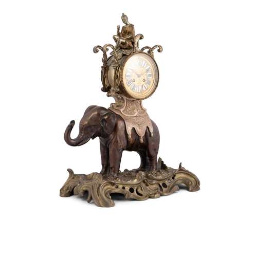 520 - A FRENCH BRONZE AND GILTMETAL CLOCK IN THE FORM OF A CEREMONIAL ELEPHANT CIRCA 1900  the cylindrical... 