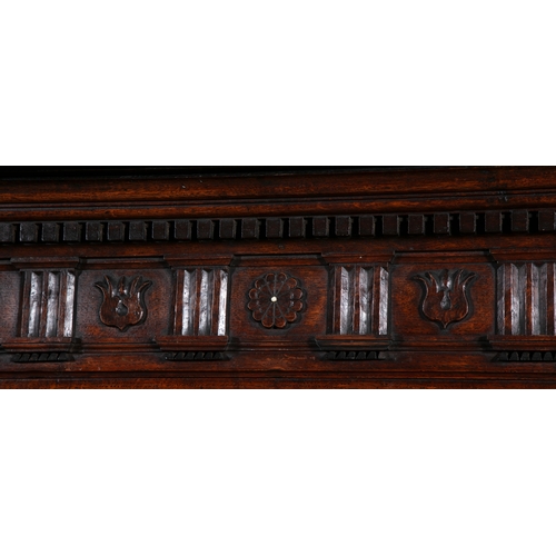 529 - A GEORGE III OAK CORNER CABINET,  the swan neck pediment with rosette terminals, twin fielded panel ... 