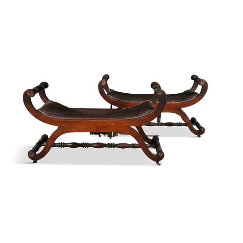 531 - A PAIR OF WILLIAM IV MAHOGANY X-FRAME WINDOW SEATS,  with inscrolled arms, with twist turned struts ... 