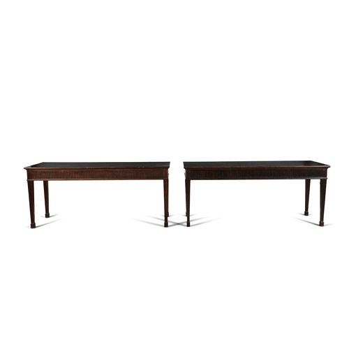 532 - A NEAR PAIR OF GEORGE III STYLE MAHOGANY RECTANGULAR SIDE TABLES 19TH CENTURY,  with fluted frieze a... 