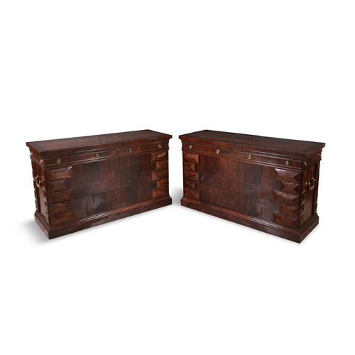 562 - A PAIR OF CONTINENTAL MAHOGANY CROSS BANDED RECTANGULAR COMMODES 19TH CENTURY,  The figured top abov... 