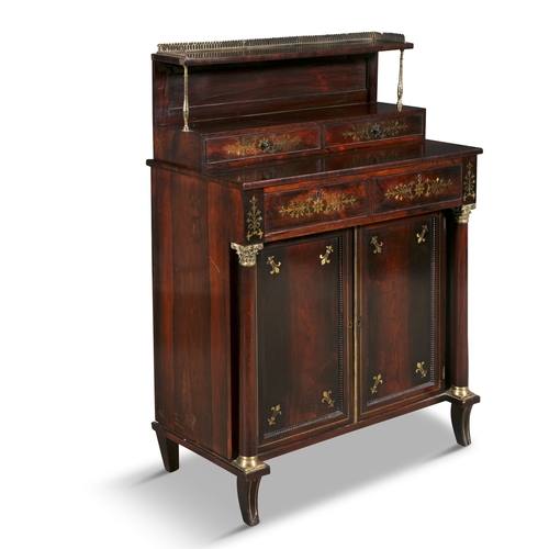 567 - AN IRISH LATE REGENCY ROSEWOOD AND BRASS INLAID CHIFFONIER,  the superstructure with a pierced three... 