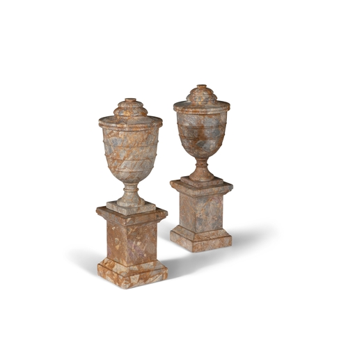 575 - A PAIR OF CONTINENTAL MARBLE URNS AND COVERS ON PEDESTAL BASES EARLY 20TH CENTURY,  51.5cm high