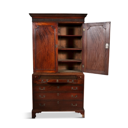 577 - AN IRISH GEORGE III SECRETAIRE BOOKCASE,  the rectangular two door top surmounted with a blind fretw... 