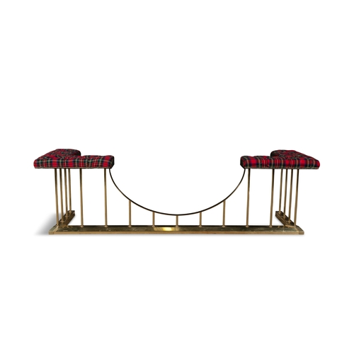 585 - A LARGE BRASS CLUB FENDER 20TH CENTURY ,   the seat upholstered in tartan fabric. 189cm wide, 58cm h... 