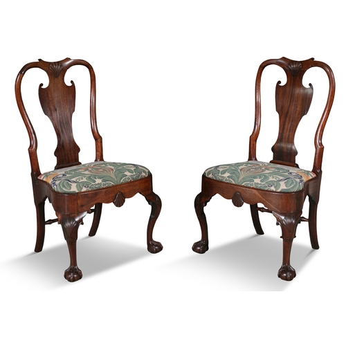 587 - A SET OF FOUR GEORGE I MAHOGANY SIDE CHAIRS    with vase shaped splats drop in tapestry seats on cab... 