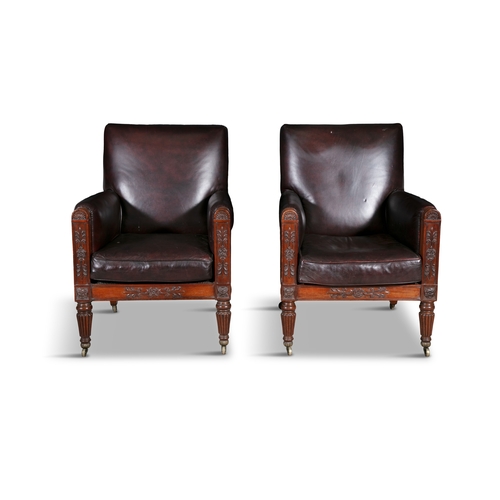 592 - A PAIR OF IRISH GEORGE III MAHOGANY FRAMED LIBRARY CHAIRS,  each with stuffed seat, back and arm res... 